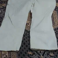 یک عدد شلوار کتان مردانه سفید نو نو است