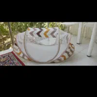 پشه بند و گهواره