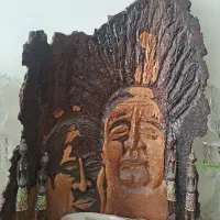 کار پتینه و مجسمه روی  پوست چوب درخت