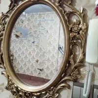 آینه دیوار کوب طلایی