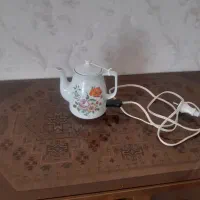 قوری برقی مسافرتی جنس  چینی