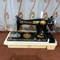 دوتا چرخ خیاطی دستی