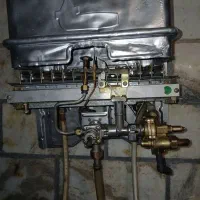 تعمیرات و تاسیسات آبگرمکن  پکیج پمپ آب  کولر آبی