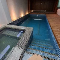 ساخت استخر تعمیرات کاشی کاری سنگ کاری لوله کشی