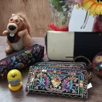 وسایل تزئینی و کیف پول و جامدادی