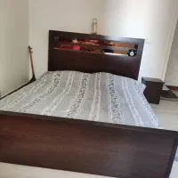 تخت دونفره همراه میز آرایش و صندلی جلو میز