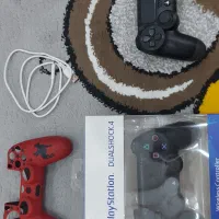 فروش دو عدد دسته ps4 با روکش و کابل