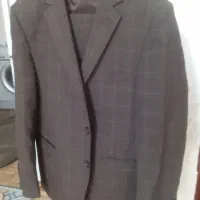 کت شلوار مردانه دست دوخت و یه عدد دنده دوچرخه