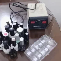 وسایل ناخن به همراه سوهان برقی وسرسوهان