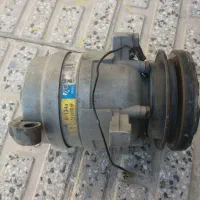 یک عدد کمپرسور کولر پراید کره ای و رادیاتور و فن