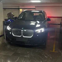 Bmw بی ام و IX1 2025داخل قرمزخاص کربن بلک بامدارک