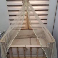 تخت و گهواره کنار مادر نوزاد آنتی رفلاکس