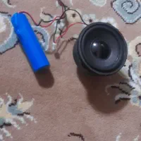 یک عدد ساب ۲ اینچ به همراه یک باتری ۱۲۰۰ میلی آمپر