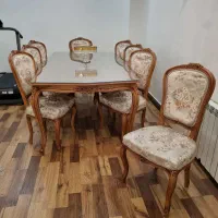میز ناهارخوری خوری هشت نفره با شیشه و هشت صندلی