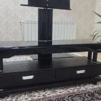 زیر تلوزیونی چرمی وشیشه ای بسیار زیبا وسالم