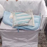 گهواره کنار مادر برقی