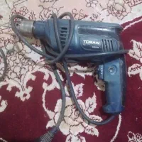 ابزار کار سنگ فرز بزرگ و دریل مارک توسن
