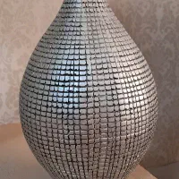 مجسمه و گلدون