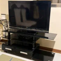 تلویزیون Sony Bravia +میز شیشه ای+ مبدل دیجیتال