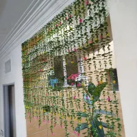 حراج آویزشمشادپرده بالکن. ریسه گل مصنوعی دیوارپوش