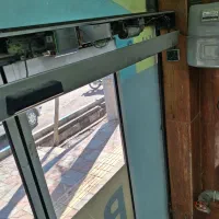 درب اتوماتیک برقی شیشه ای کرکره بازویی ریلی