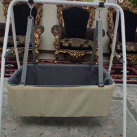گهواره نوزاد و آغوشی