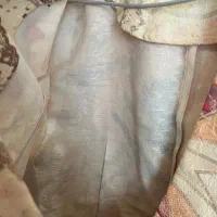 کت دامن|لباس|قم, چهار امامزاده|دیوار