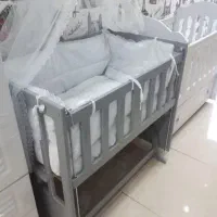 تخت گهواره ای نوزاد