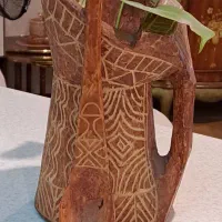 پارچ و قاشق چوبی