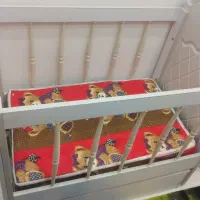 تخت گهواره ای نوزاد