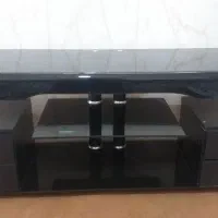 زیر تلویزیونی شیشه ای