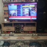 یک عدد زیر تلویزیون ویک عدد سینما خانگی