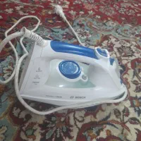 اتو بخار و چراغ فیتیله ای