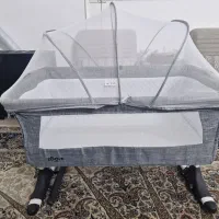 گهواره نوزاد تخت کنار مادر زویه