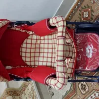 کالسکه وقنداق فرنگی کودک