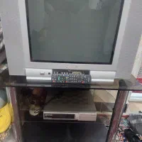 تلویزیون رنگی ۲۱ اینچ و میز تلویزیون