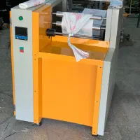 دستگاه رول کن سفره یکبار مصرف پرفراژ دار سه کاره