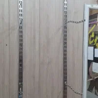 رگال دیواری با چوب لباسی