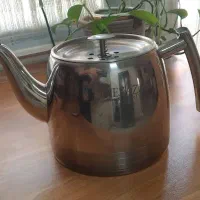 کتری۳لیتری استیل  کف چدن کاملا سالم
