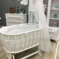 گهواره کنار تخت مادر
