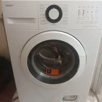 ماشین لباسشویی خشک کن بست