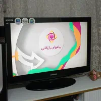 میز تلویزیون شیشه ای