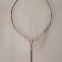 تور ماهی گیری و پرنده