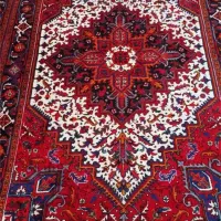 بافنده فرش نیمه کاره