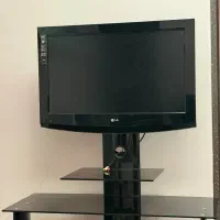 تلویزیون LCD  ال جی LG ۳۲ اینچ با میز تیوی