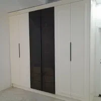 ساخت ونصب وتعمیرات کابینت وکمد دیواری ....