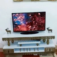 میز ،تلویزیون، بوفه، ساعت،مبل