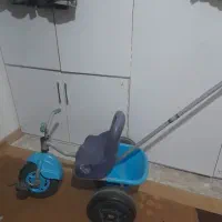 سه چرخه و کالسکه و عروسک