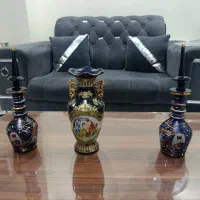 گلدان سورمه ای لب طلایی و جام و کاسه میوه خوری