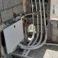 لوله کش ساختمان اب فاضلاب وبرق کاری ساختمان